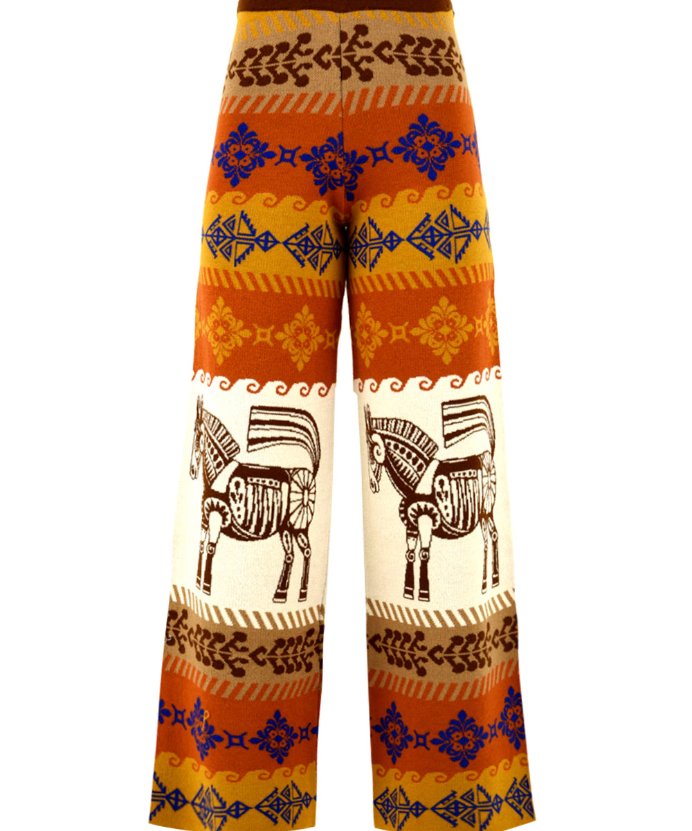 Immagine frontale del pantalone in misto lana Akep da donna con ampia gamba e fantasia jacquard con cavalli.