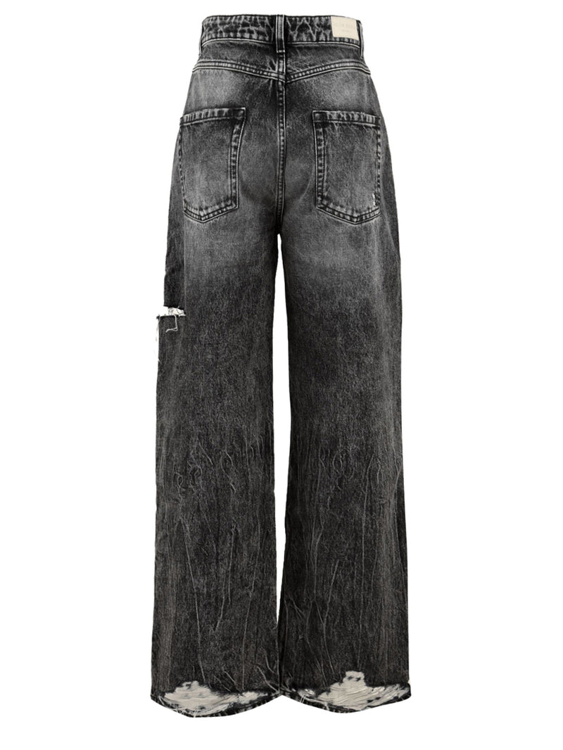 Immagine retro del jeans in nero Poppy da donna firmato Icon Denim Los Angeles, gamba dritta e ampia con strappo laterale,tasche e passanti per cintura.